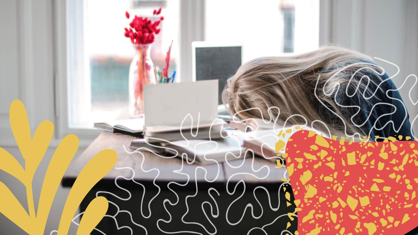 Emotionally exhausted woman with her head down on her desk